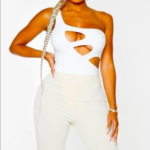 PrettyLittleThing white body suit. NWT size 4. Open splits and one shoulder